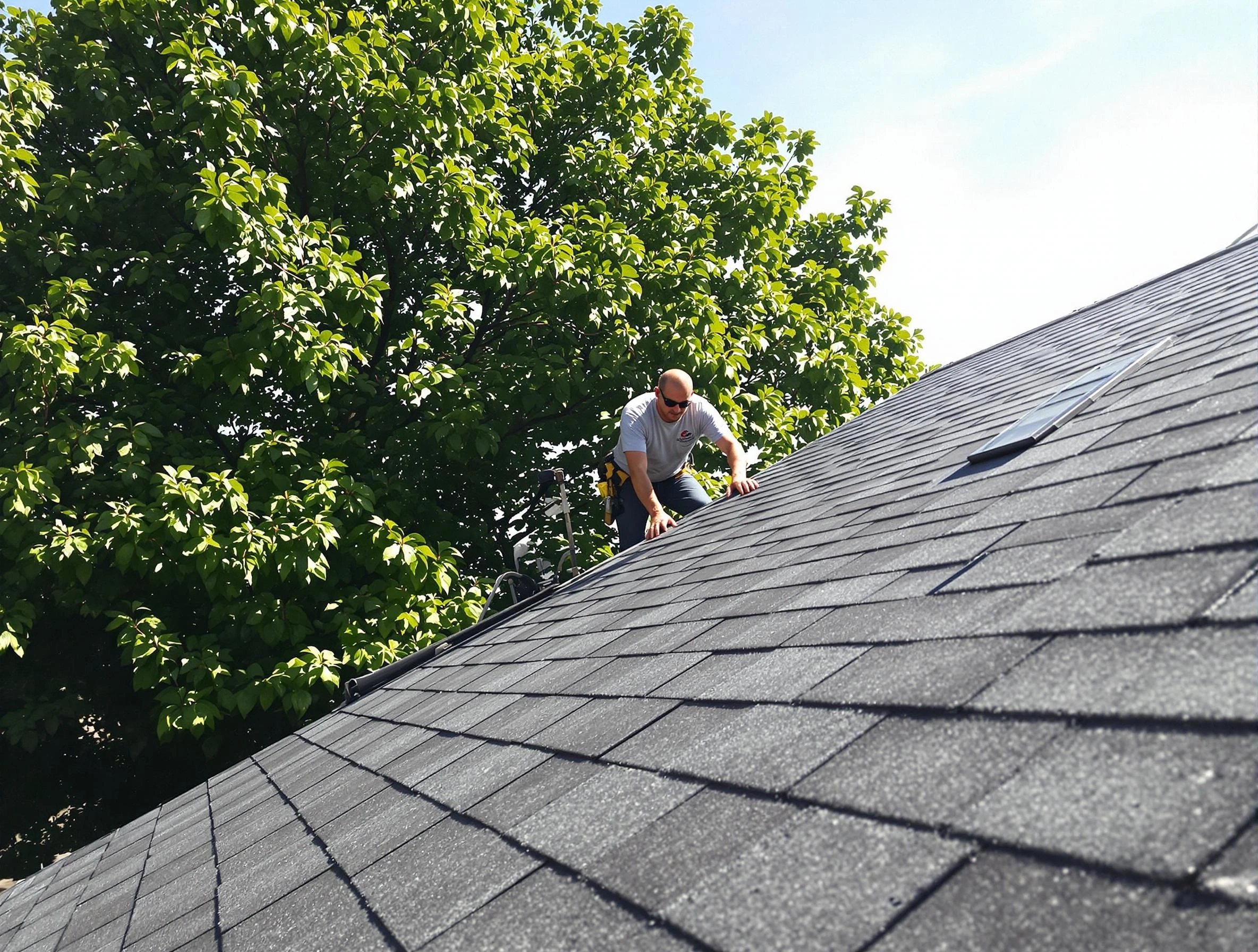 Certified roofers from New Franklin Roofing Company working in New Franklin, OH